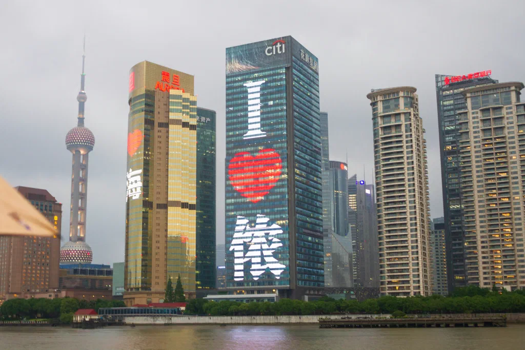 Shanghai skyline with buildings in the background.